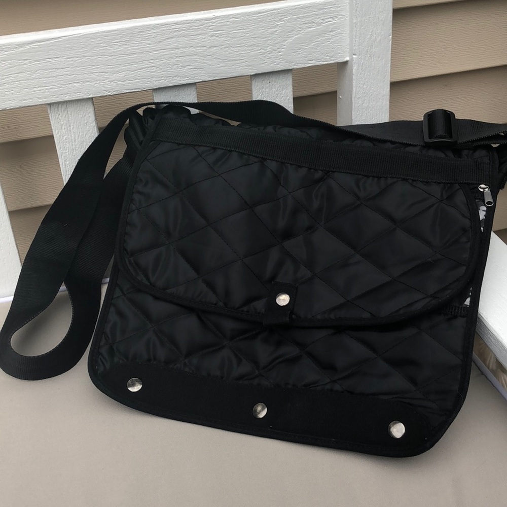 Black quilted messenger bag